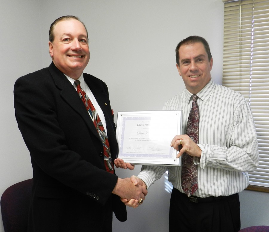 Sean Cleary is presented the Verona Chamber of Commerce President’s Award by Chamber President Nathan Strutz.
