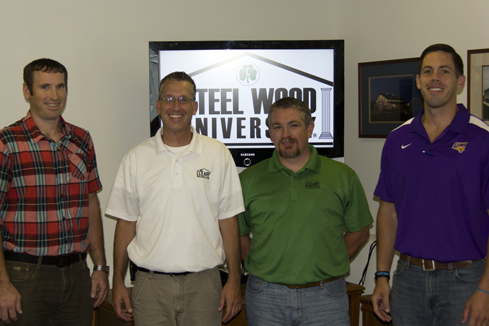 4 Cleary employees who received certification at Steel Wood University. 