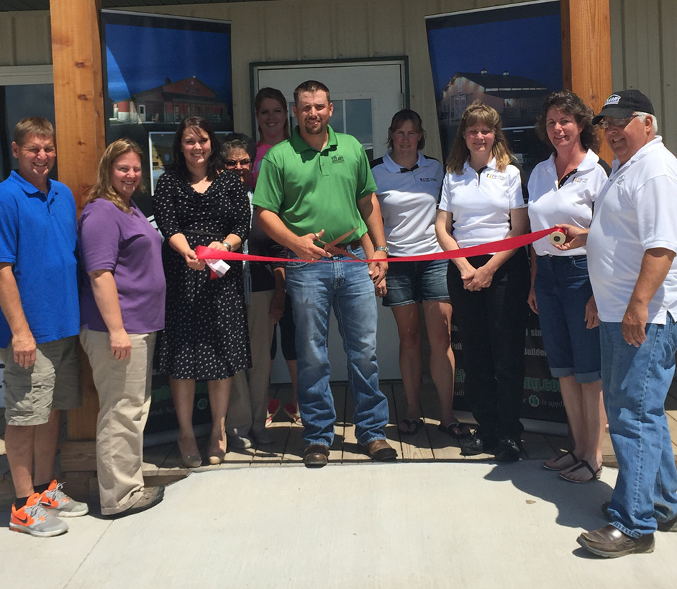 Members of the Tipton Chamber of Commerce join the Cleary Team for a Ribbon Cutting Ceremony at Cleary’s new office.