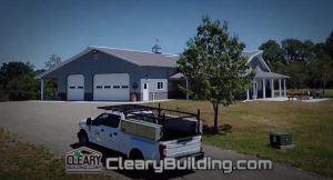 Screenshot from commercial of a Cleary Building Corp. truck driving up a driveway towards a Cleary Building.