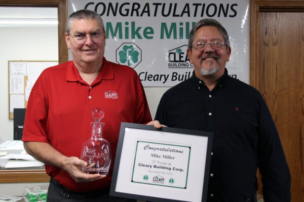 Mike Miller is presented with anniversary decanter